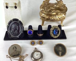 BIHY101 Antique Jewelry Victorian Casket Jewelry Box An assortment of antique and vintage jewelry, as well as a gold colored Victorian casket jewelry box.
