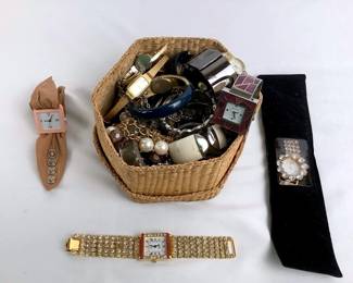 BIHY216 Vintage Watches  Lots and lots of different styles of watches. From pocket watches to bracelets with a watch charm on them.
