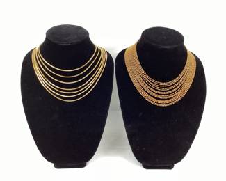 BIHY103 DOrlan  Victorian MultiChain Necklaces A signed D'Orlan gold plated multi-chain necklace, as well as a victorian 15 strand, gold toned metal micro bead drape necklace.
