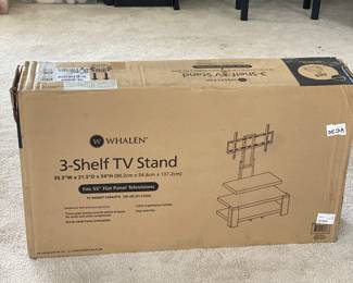 New in box tv stand 