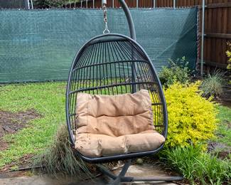 Outdoor patio furniture, basket, chair, hanging chair
(not off center it was swaying in wind)