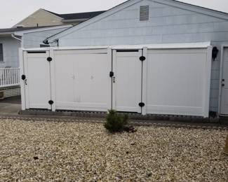 Vinyl shower enclosure and storage area