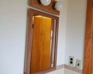 Mirrored medicine cabinet