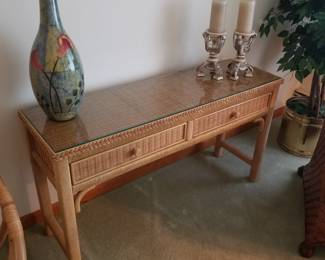 Wicker two-drawer foyer table by Henry Link