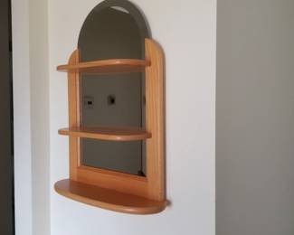 Wall mirror with shelves