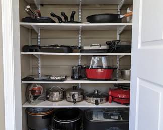 Very nice assortment of small kitchen appliances, pot, pans, etc.