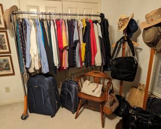 More men's clothes, hats, hat racks, suitcases.                One of the hats, by ATL Company B.M. Franklin, actually has a rattlesnake rattle hanging off of it.                                                                                                              I can already see the guy who wants this - he has a jacked up truck, with nuts hanging off the rear trailer hitch.