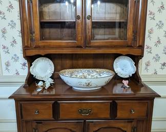 Canadian version of American Colonial furniture hutch, antique English porcelain bowl and pair of plates, on stands. 