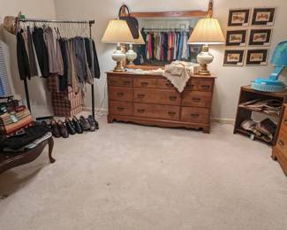 Upstairs bedroom, hiding men's clothing, shoes and hats, as well as women's shoes and handbags by Brighton, Michael Kors and My Flat in London. Men's clothing department, with suits, sport coats, ties, pants, shirts, shorts and shoes. There's also a maple dresser, with matching mirror. 