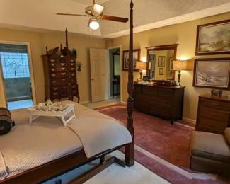 Primary bedroom with breakfast tray you can use to train your honey to treat you in the manner in which you need to be accustomed.  Vintage mahogany highboy, by Councill Craftsmen.