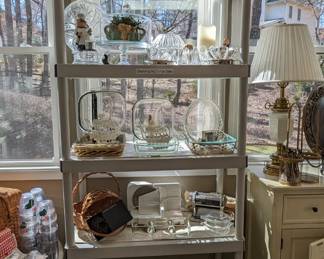 More glass kitchen doodads, casserole dishes, a meat slicer and countertop pasta machine. 