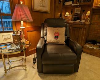 The other of the pair of real leather power recliner/lift chairs, round brass/glass side table, one of a pair of glass/resin table lamps and hand-painted original watercolor on stand.