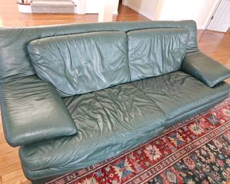 There are 2 sofas, this one is excellent condition