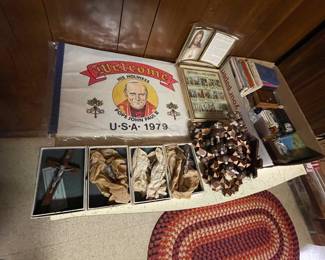 Religious (Catholic) items, including crucifixes and prayer books.