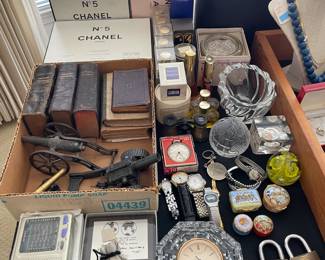 New Chanel No. 5 EDT, after bath powder, bath gel and body cream, in their original boxes, new Lanvin "My Sin" perfume, and Waterford paperweight and desk clock.