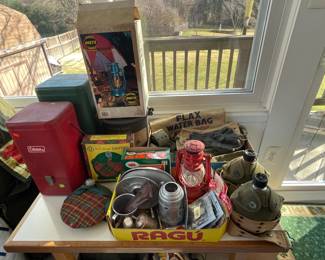 Coleman heaters, kerosene lanterns and other camping items.