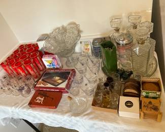 Vintage barware, including a large set of Culver "Siam" tumblers and sets of TWA and NASA double old-fashioned glasses.