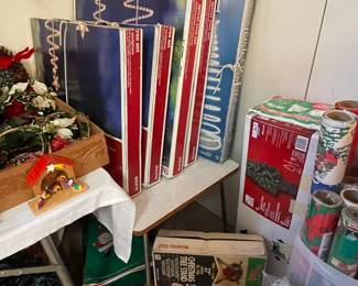 Multiple sets of outdoor Christmas lights and 4ft artificial Christmas tree.