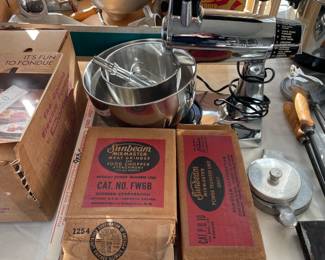 Vintage Sunbeam standing mixer and attachments.