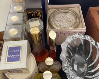 Sterling-rimmed coaster set, perfumes, Orrefors crystal bowl and a pair of vintage French opera glasses.