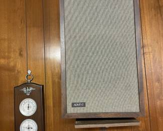 One of a pair of Advent mounted speakers.