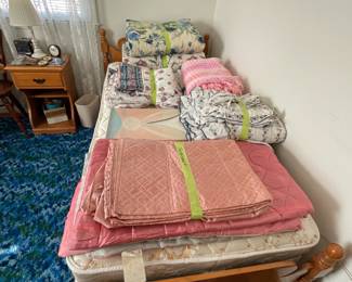 One of a pair of matching solid maple twin-size beds. Lots of linens available for twin beds.