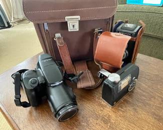 Olympus ED 35-180 IS-3DLX film camera with Tiffen lens and vintage Argo-Flex camera.