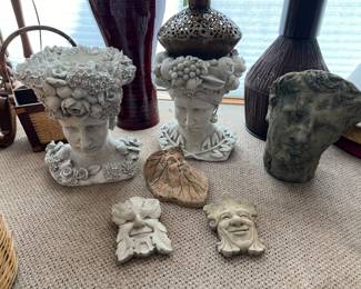 Composition and cast head planters decorations