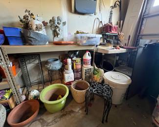 Loads of outdoor planters, pots and stands. Very nice garage shelves