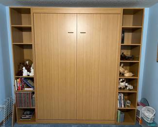 Queen size Murphy Bed dimensions are 96"Wide x 91" Tall x 19" Deep. Book Shelves are roughly 19" wide.