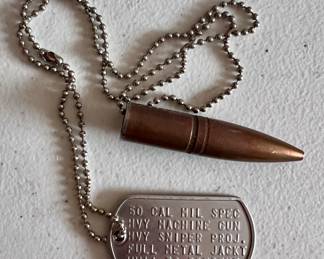 Bullet with description on dog tag