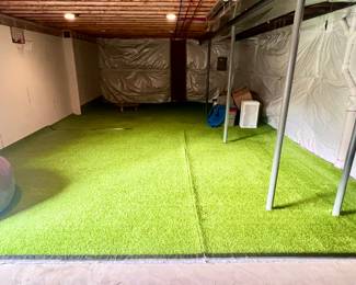 Premium Synthetic Turf  Large Faux Grass / Astro Turf (The Lighting in the Picture makes this look lighter in color than it is) It is a dark green color.