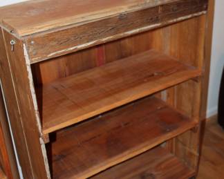 shop-made rustic bookcase with hidden top compartment