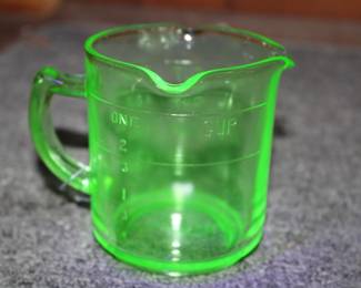 Kellogg's vaseline glass measure