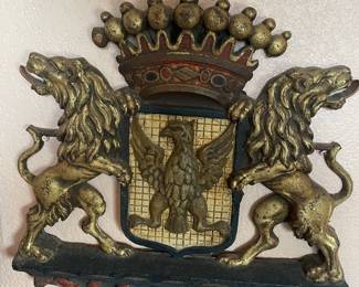 Antique, heavy, cast iron crest