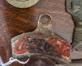 A collection of cast-iron vintage bottle openers