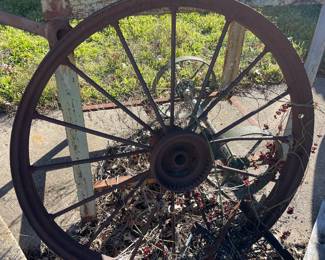 Several antique wagon wheels