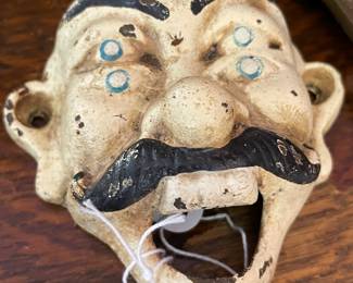 Cast-iron bottle openers