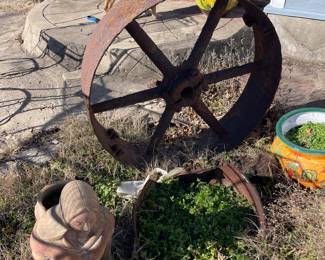 Cast-iron wagon, wheels, and garden decor