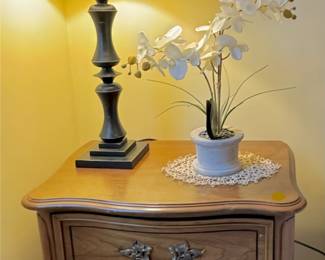 Solid Wooden Nightstand (One of Two), Table Lamp, Stone Flower Decor