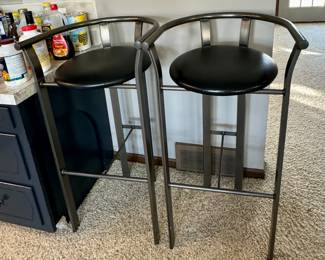 Pair of sleek metal bar stools w/ leather seating