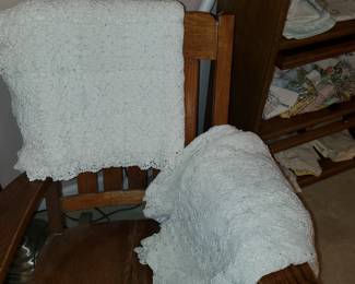 Two crocheted spreads or tablecloths