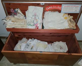 Trunk with many linens...
