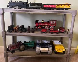 Middle shelf cast iron trains and cars