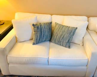 2 of 2 Cream Colored Love Seats