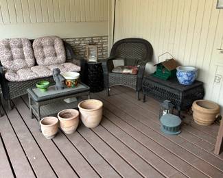 Outdoor shot - will take a better one.  There is a two-seater sofa, glass top table, long bench with storage and 2 armchairs.  All in great shape.