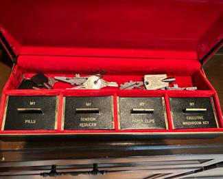 The Executive Pencil Box with separate compartments for "tension reducer" and "pills".  Not completely sure this was a joke-y novelty item.