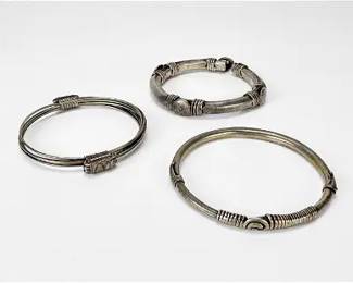 Two Antique Silver Alloy Cuff Bracelets from India plus One Silverplate Wire Bracelet
