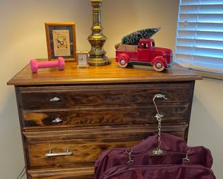 dresser and hanging suiter bag