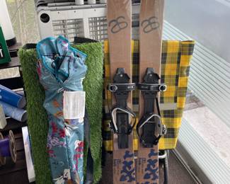 storage rack, skis and sports chair